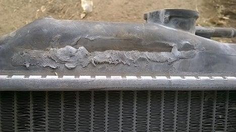 JB Weld on the Radiator, from the lemon car they sold me.