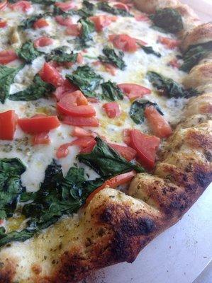 Margarita Pizza, Fresh hand tossed locally sourced dough.