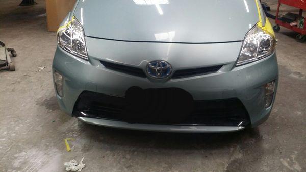 Toyota Prius in U Han repair shop