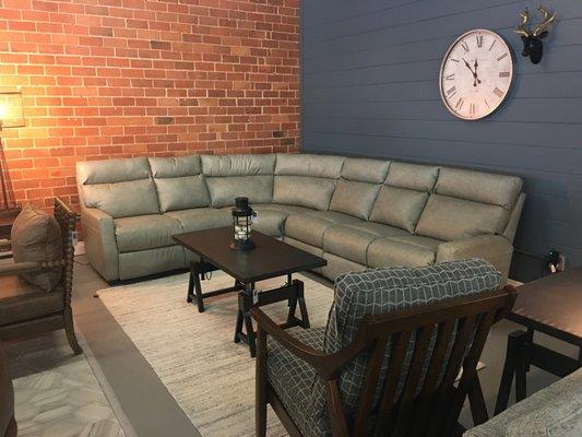 Style, Comfort and Design. This Full Leather Sectional has all of the above.