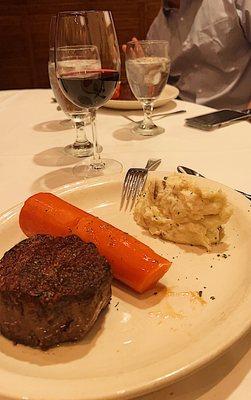 Sirloin steak with a big carrot and garlic mashed potatoes. Very delish