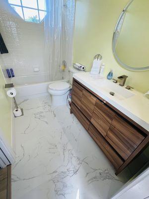 Guest bathroom tile/ baseboards /casings