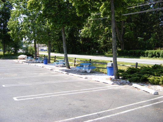 Outdoor Semi-Shaded seating area with round tables