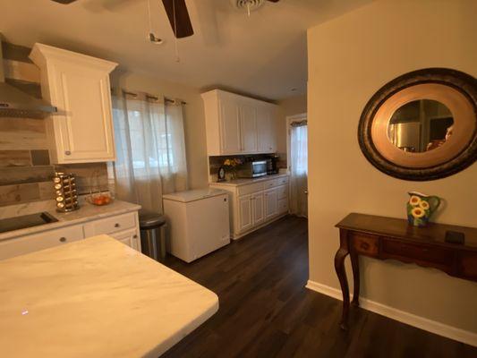 Cabinets, granite countertops, flooring. Completely taken down and redone. My kitchen flooded with an insurance claim, I got a New Kitchen!