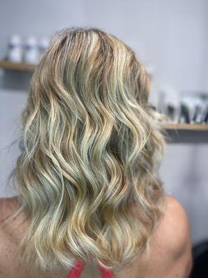 Layered haircut with waves for texture look