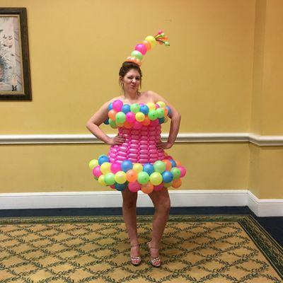 Yes, it's a balloon dress that glows in black light.