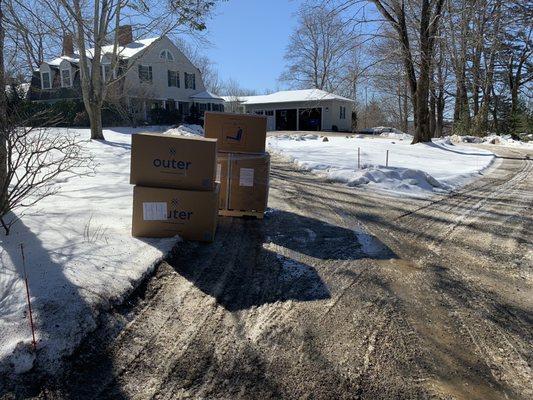 Dumped boxes at the end of the driveway. Terrible service