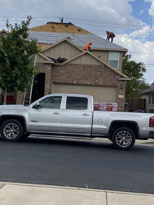 Replacing shingle on two store house