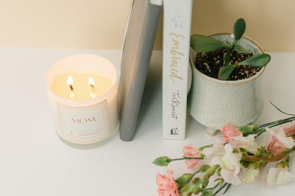 sweet floral cherry blossom fragrance with a woody amber background enhanced by a white musk base
2-wick 9 oz. soy candle