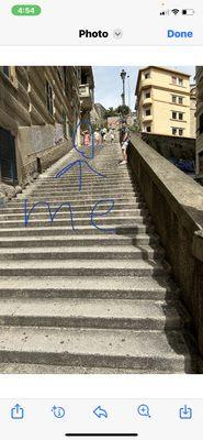 Me at the top of the steps in Italy with my family.