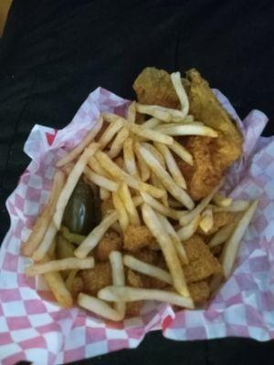 Approximately eight of the smallest catfish nuggets,tasteless fries,and pork chop. All for $20 definitely a waste of money.