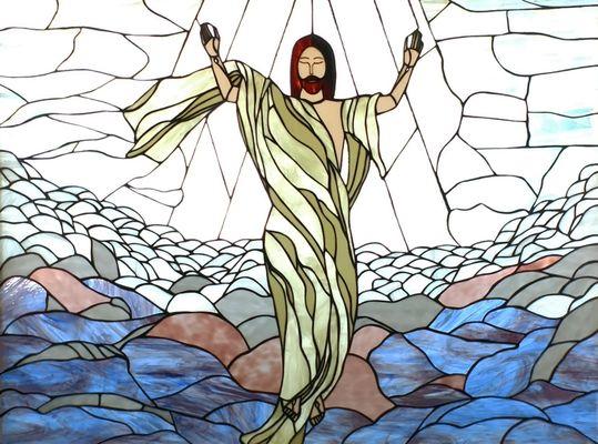 A portrayal of Jesus Christ in stained glass.