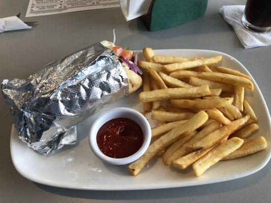 Beef and lamb gyro sandwich combo with drink and fries.