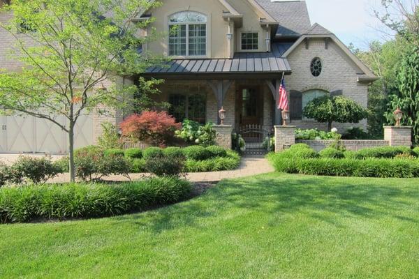 Welcome visitors with a fragrant, lush front door garden.