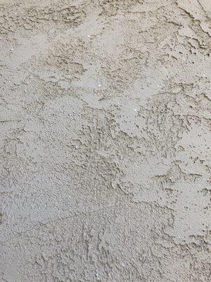 More splattered stucco