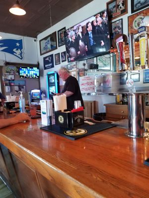 Juke box by the side entrance at end of bar