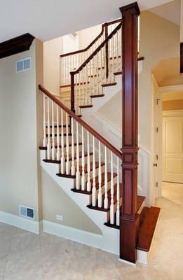 U-Shape Stair With Wood Baluster and Column Wrap that covers metal support