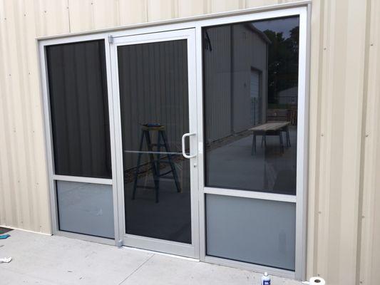 Aluminum storefront doors