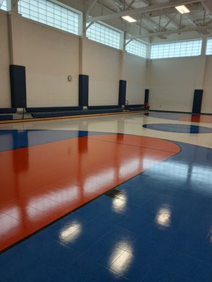 1
 strip and refinish a vinyl gym floor