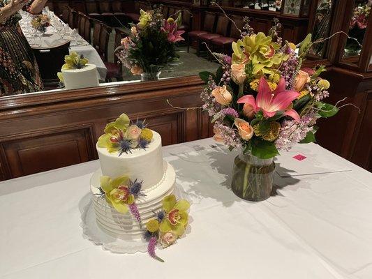 Chocolate layer cake filled with ganache, White layer cake filled with fresh strawberries.  Flowers from Sequoia Plaza Flowers.