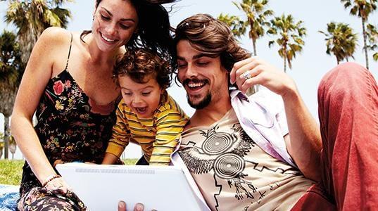 A family enjoying their tablet.