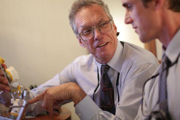 Dr. Larry Bowers and Dr. Langley Bowers discuss a case.