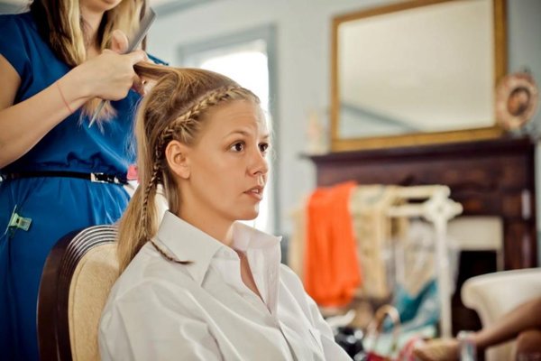 Styling hair for a bride on her wedding day