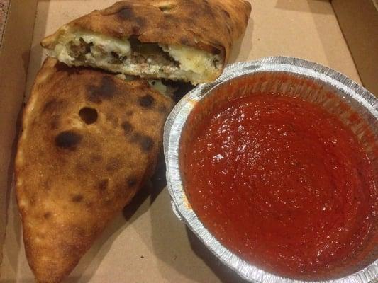 Meatball & jalapeño calzone to go w/ lots of sauce :)