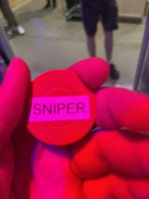 The token to get the Sniper Rifle which costs $15.00