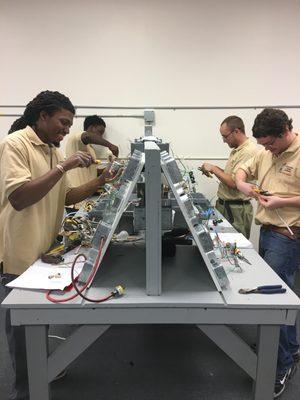 Electrical students practicing wiring