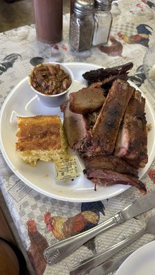 Meat sampler with beans and cornbread