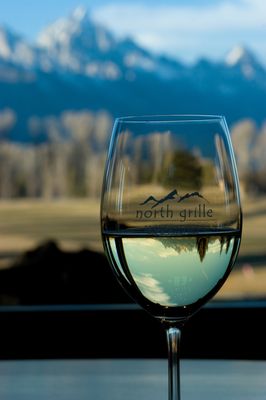 Enjoy a cool glass of wine on the North Grille's patio after a round of golf on our world renowned course.