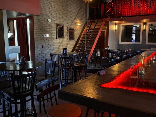 Bar tables and upper wine area