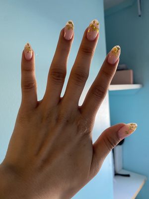 Tips with natural base and gold tips