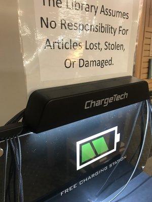 Charging station for your phone but stay nearby looking by the sign.