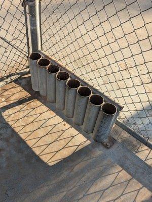 Tubes in the dugout for baseball bats