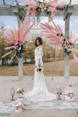 Outside on the Pergola. Florals by Fauxtastic Floral Creations.