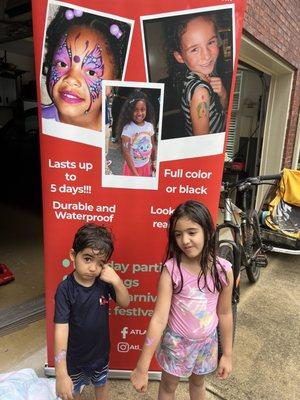 Siblings enjoyed tattoos at birthday pool party.