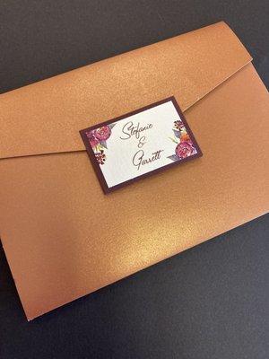 The outside of the Pocket Invite is secured with either a tag or a belly band for that added personal touch.