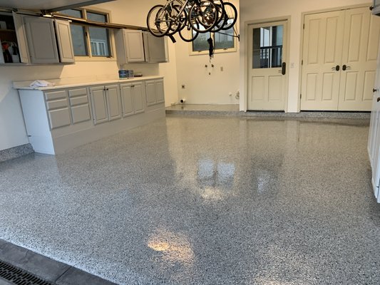 Here is an epoxy floor with flake added followed by two clear coats.