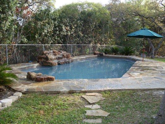 Pool renovation with new flagstone with Lt. Gray Surface.