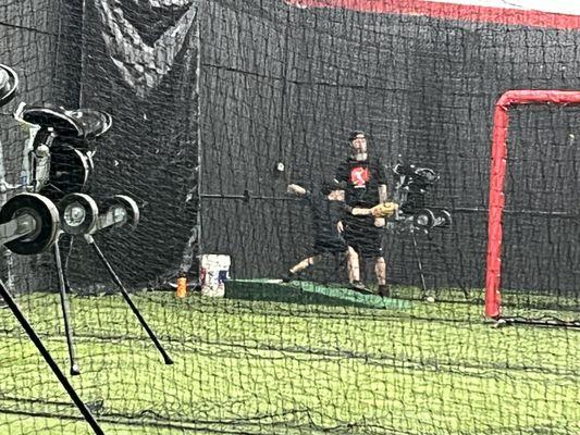 My youngest in pitching lesson with former MLB pitcher!