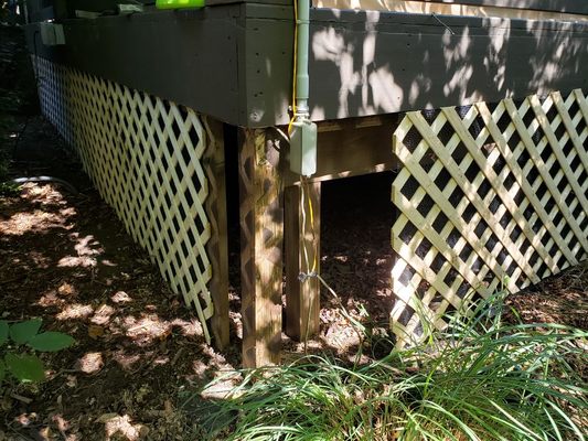 Lattice and wire exclusion around deck. Keeping out Chipmunks and mice!