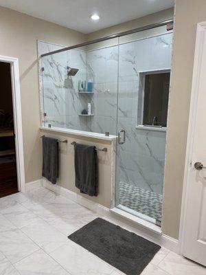 Removed tub and reoriented/enlarged the shower