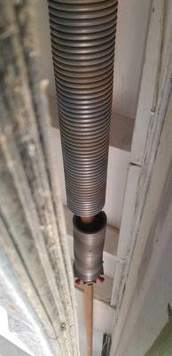 Broken torsion spring