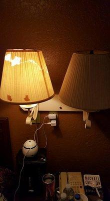 I think you can afford to buy new lamp shades, The room was dirty, dark and horrible.