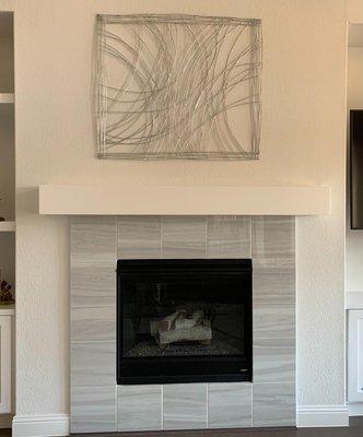 Old builder grade fireplace and mantel