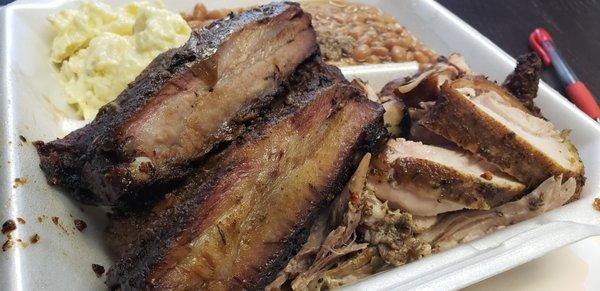 Pork ribs, pulled pork & pulled chicken. Sampler platter