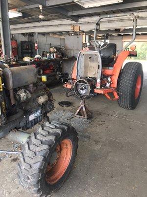 A Tractor split apart to repair.