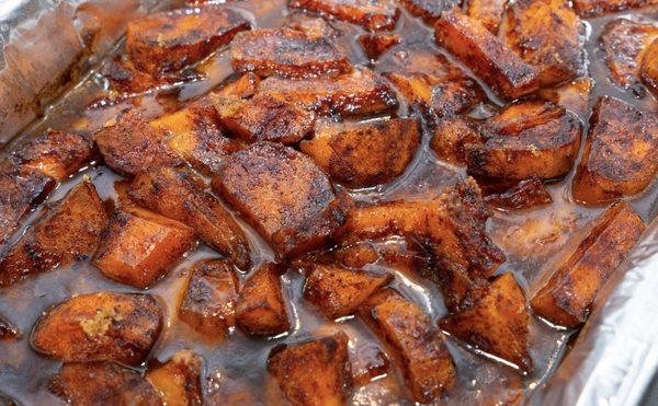 Experience comfort with The Corner Boyz LLC's candied yams. Sweet potatoes simmered in our signature syrup.